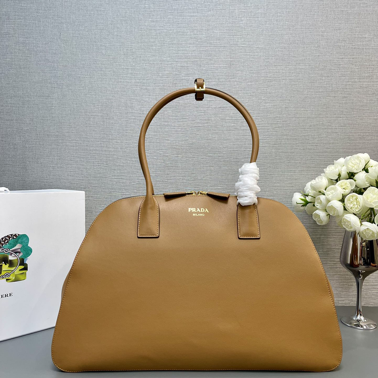 Pra*a top handle bags